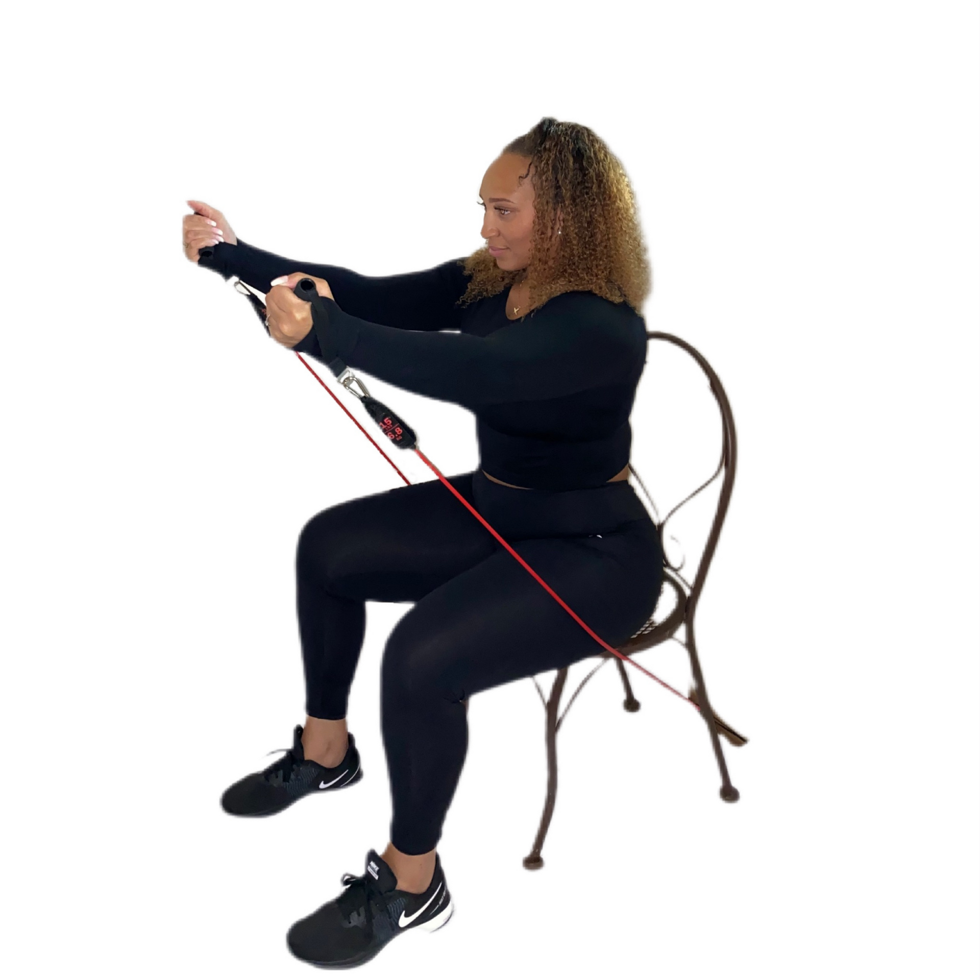 Woman during arm raises workout with the Van Esther Resistance Band Set